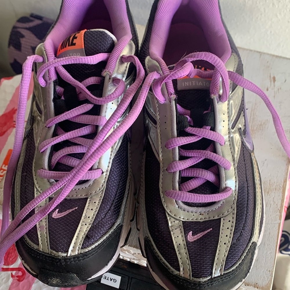 Purple Nike running shoes in good condition